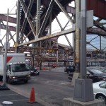 Train on the elevated tracks at Queens Plaza