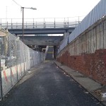 Walking up to stairs leading to the Willis Avenue Bridge
