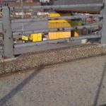 Temporary walkway supported by shipping containers