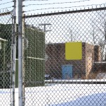 Power station? behind fence