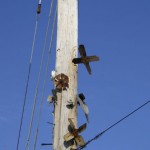 Fan blades on a telephone pole